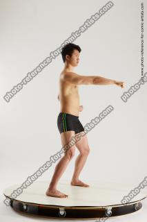 asian man taekwondo poses lan 14b